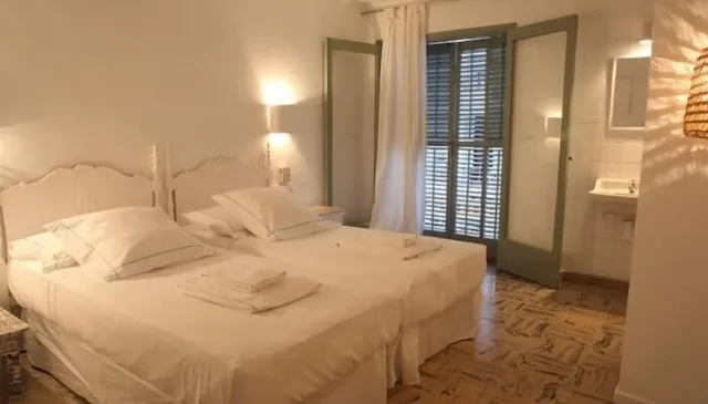 غرفة قياسية بسريرين منفصلين بشرفة بحمام مشترك، Hostal Juanita 1/1