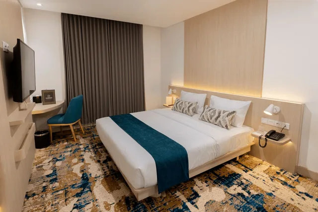 غرفة ديلوكس بسرير مزدوج بدون إطلالة، Cordia Hotel Yogyakarta - Hotel Dalam Bandara 1/4