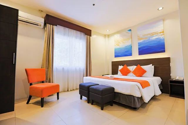 غرفة ديلوكس بسرير كينج، Holiday Suites Hotel Amp Resort 2/4