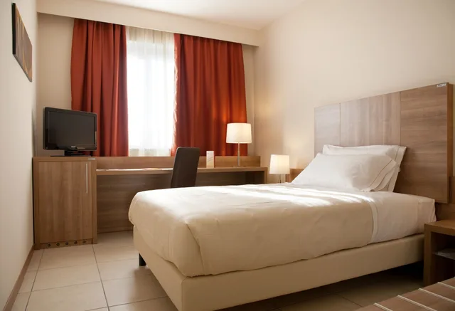 غرفة ثلاثية، Hotel San Luigi 1/4