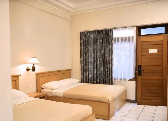 غرفة ديلوكس بسريرين كوين، Pantai Indah Resort Hotel Barat 1/2
