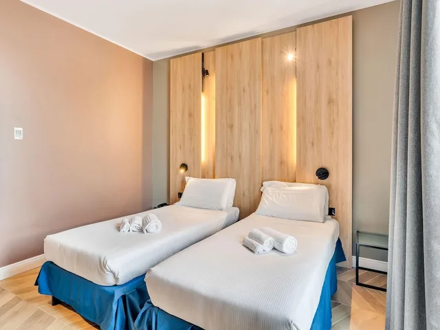 غرفة سوبيريور بسريرين منفصلين، B&B Hotel Milano Aosta 1/10