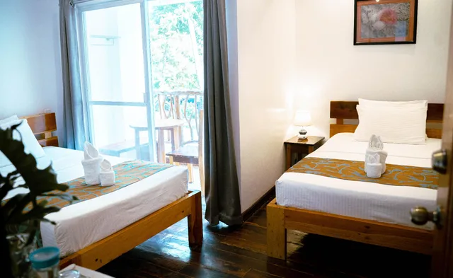 غرفة ديلوكس بسريرين مزدوجين بشرفة، DIVEGURUS BORACAY BEACH RESORT 2/2