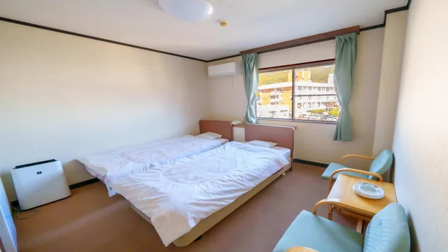 غرفة قياسية بسريرين منفصلين بإطلالة على البحر في المبنى الرئيسي، Maruya Hotel 1/1
