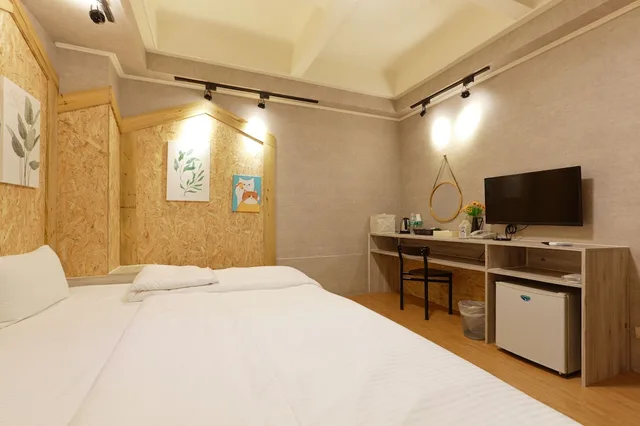 غرفة اقتصادية ثلاثية بسرير مزدوج وسرير فردي، Tainan Inn 1/3