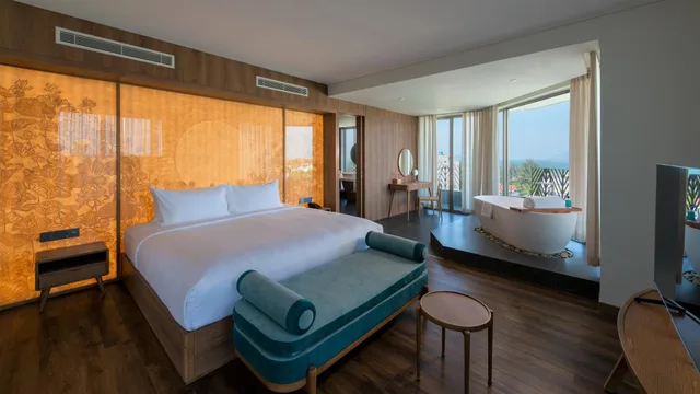 Vip, Family Suite, King and Twin Beds, Living Area، Bellerive Hoi An Resort & Spa 2/2