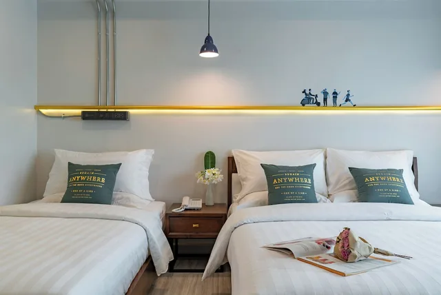 غرفة عائلية ثلاثية بسرير كوين وسرير فردي بإطلالة على المدينة بشرفة، Momo Hotel 3/6