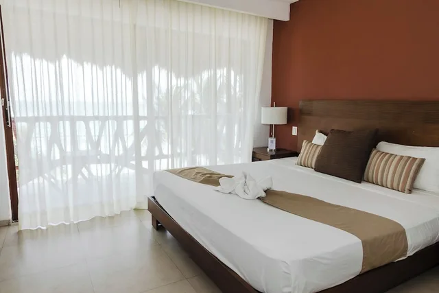 غرفة بسرير كوين بإطلالة على البحر، Koox Quinto Sole Boutique Hotel 3/8