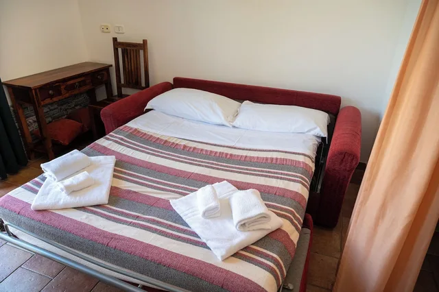 شقة بانورامية بسرير مزدوج بغرفة نوم واحدة مع أريكة، Villaggio Le Querce 5/8
