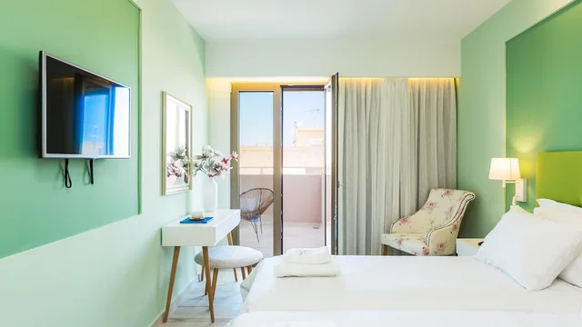 جناح استوديو ديلوكس بسريرين منفصلين مع أريكة بحوض جاكوزي، Menta City Boutique Hotel 1/5