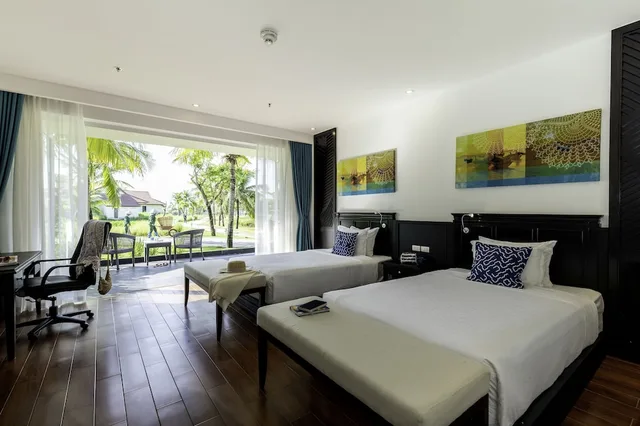 غرفة ديلوكس بسرير كينج وسريرين منفصلين بإطلالة على الحديقة، ROBINSON Nam Hoi An 1/4