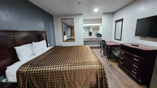 غرفة بسرير كينج، Express Inn Hobby Airport 1/8