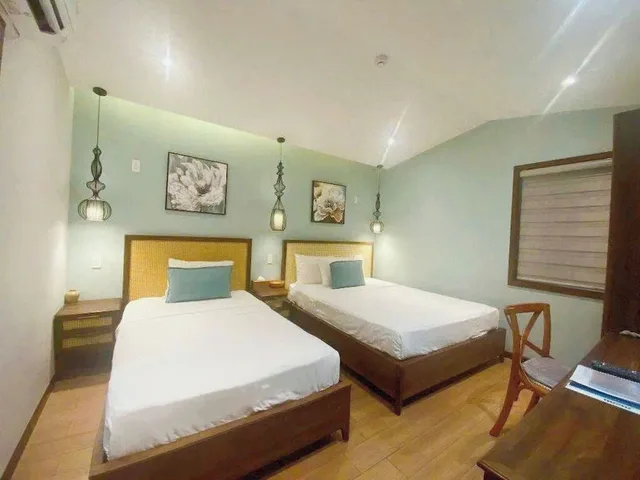 غرفة قياسية ثلاثية بسرير كوين وسرير فردي، Flower Beachstay & Coffee 1/6