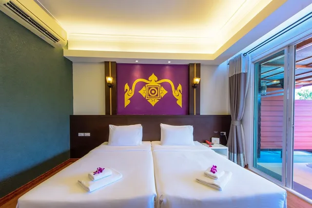 غرفة ديلوكس بسريرين منفصلين بإطلالة على المسبح، Baan Grood Arcadia Resort and Spa 1/6