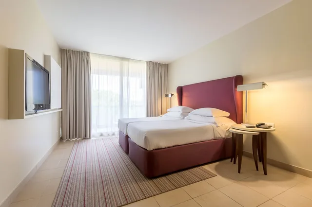 جناح بسريرين منفصلين بغرفة نوم واحدة مع أريكة، NAU Sao Rafael Suites 1/3