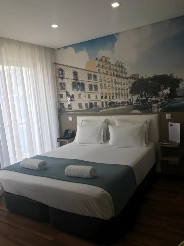 غرفة بسرير كينج وسرير كوين، FENICIUS CHARME HOTEL 4/6