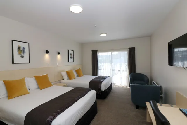 غرفة ديلوكس بسرير فردي وسرير كوين، The Victoria Hotel Dunedin 6/7