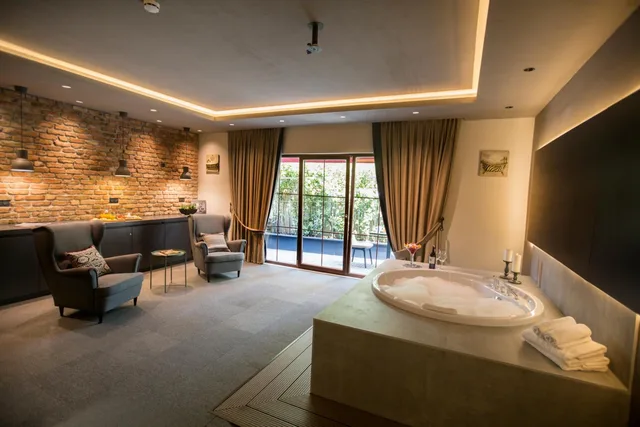 جناح بسرير كوين بشرفة بجاكوزي، Cityloft 24 Suites 5/7