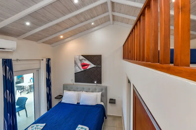 Loft, Suite, 1 King and 1 Single Beds, Pool Side، Swiss Paradise Aruba 1/7
