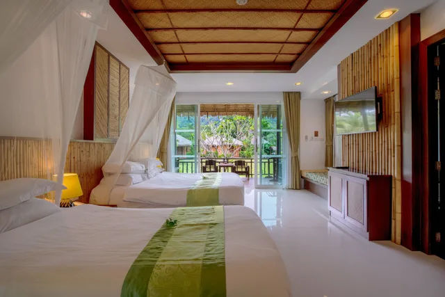 كوخ بريميير ثلاثي بسرير مزدوج وسرير فردي، Ban Sainai Resort - SHA Extra Plus 5/10