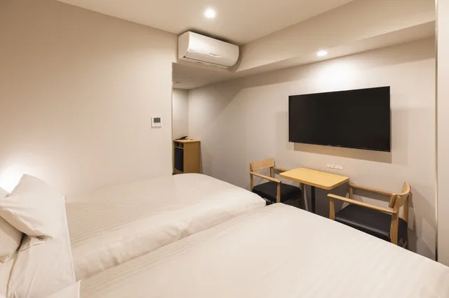 غرفة سوبيريور بسريرين منفصلين، Sotetsu Fresa Inn Daimon 2/3