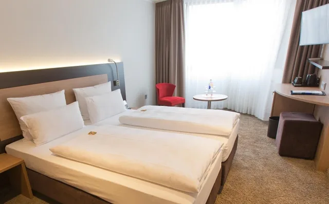 غرفة كومفورت بسرير كوين، Astor And Aparthotel 1/6