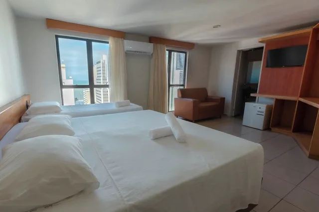 غرفة بسرير مزدوج وسريرين منفصلين، Rede Andrade Onda Mar Hotel 4/10