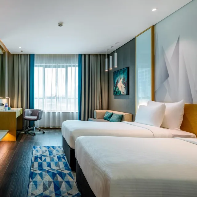 غرفة بسرير مزدوج أو سريرين منفصلين، Flora Inn Dubai 1/5