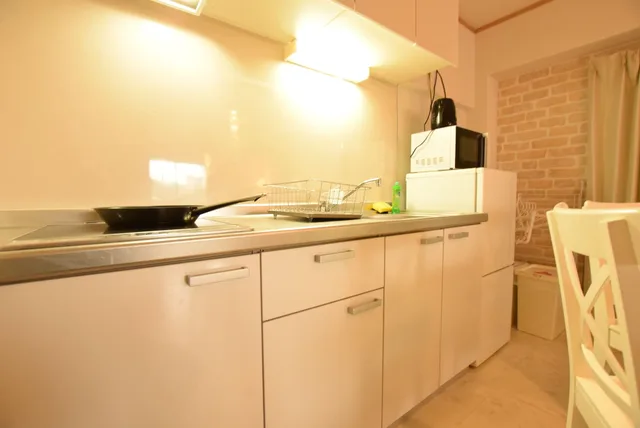 غرفة بسرير مزدوج مع أريكة، Yokoduna Hostel 6/6