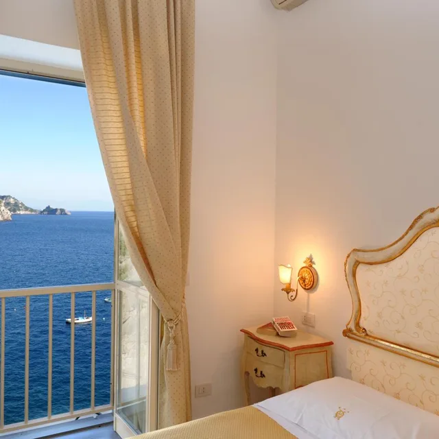 غرفة بسرير كينج بإطلالة على البحر، Hotel Onda Verde 4/5