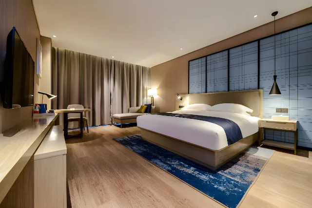 غرفة ديلوكس بسرير كوين، Echarm Hotel (Guizhou Xingyi Jushan Avenue) 1/1