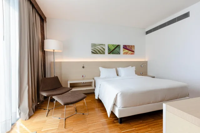 جناح ركني بسرير كينج مع أريكة، Hilton Garden Inn Venice Mestre San Giuliano 1/2