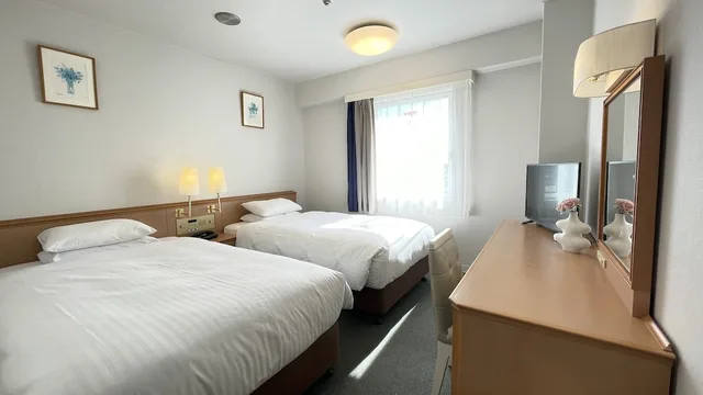 غرفة بسريرين منفصلين، Grandpark Hotel Panex Iwaki 1/4