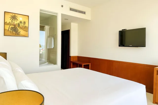 غرفة ديلوكس بسرير كينج بإطلالة جزئية على البحر، TTC Hotel - Michelia 8/10