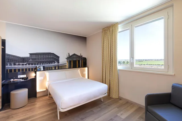 غرفة بسرير كوين، B&B Hotel Roma Fiumicino Aeroporto Fiera 1 7/10