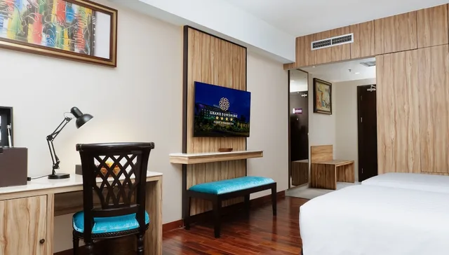 غرفة تنفيذية بسريرين منفصلين بشرفة، Grand Sunshine Resort and Convention 6/10