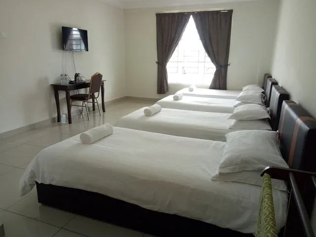 غرفة رباعية بأربعة أسرّة، Hotel Mutiara KGMMB by ZUZU 3/3