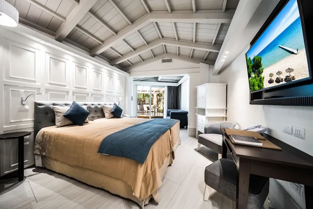 غرفة فاخرة بسرير مزدوج أو سريرين منفصلين بإطلالة على الحديقة، Forte Village Resort Villa del Parco 2/4