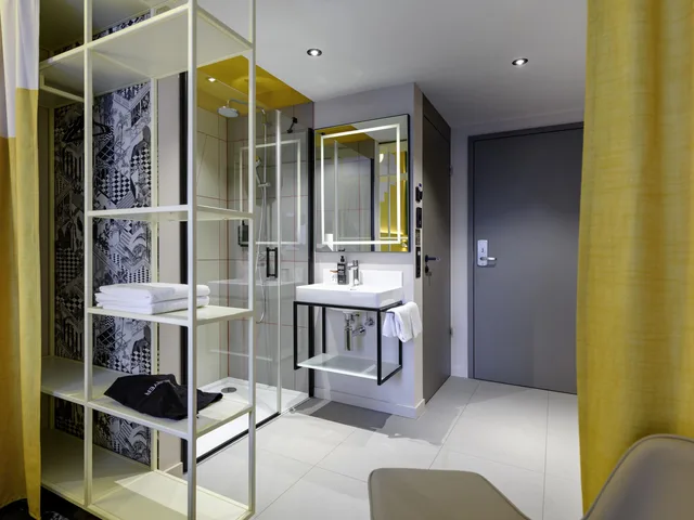 غرفة قياسية بسريرين منفصلين مع أريكة، Ibis Styles Zurich City Center 6/6