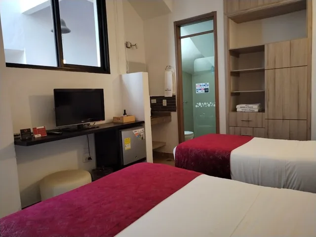 غرفة قياسية ثلاثية بسرير مزدوج وسرير فردي، Hotel Capitan Ricaurte 3/7