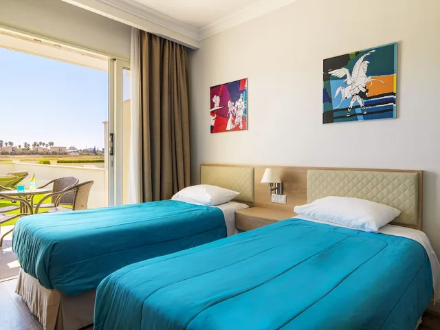 Family Suite, Garden, 1 Double and 3 Single Beds, Private Garden، Olympic Lagoon Resort Ayia Napa 2/4