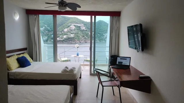 غرفة سوبيريور رباعية بإطلالة على البحر، Hotel Bahia Taganga 2/5