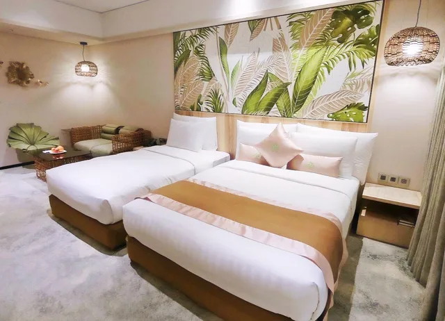غرفة ديلوكس ثلاثية بسرير كوين وسرير فردي، ARTREE HOTEL 1/3