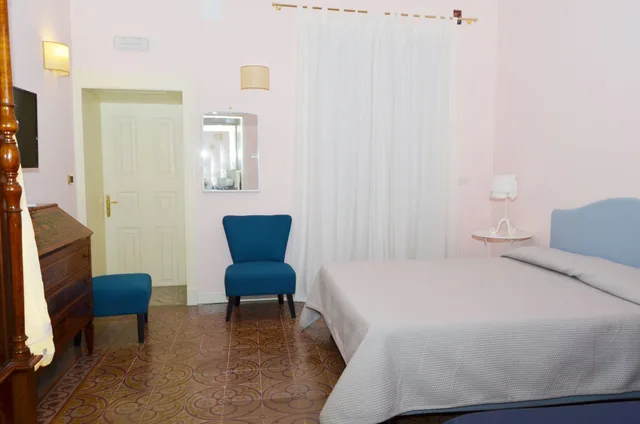 غرفة ثلاثية بسرير كوين وسرير فردي، B&B Casa D'alleri 7/10
