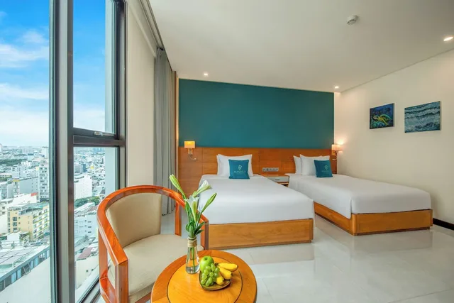 غرفة ديلوكس بسريرين مزدوجين بإطلالة جزئية على البحر، Mandila Beach Hotel Danang 5/10
