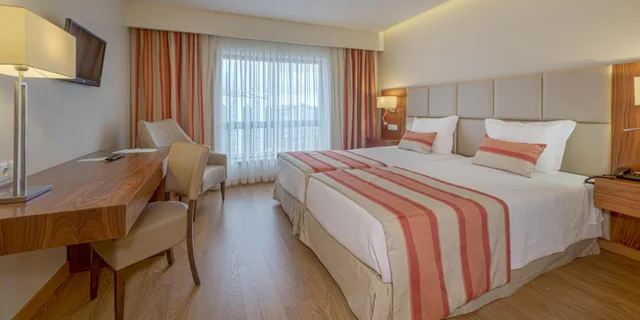 غرفة بسرير مزدوج أو سريرين منفصلين، Hotel Cinquentenario & Conference Center 1/7