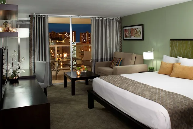 استوديو بسرير كينج مع أريكة بمطبخ صغير، Skyline Island Colony Hotel 1/10