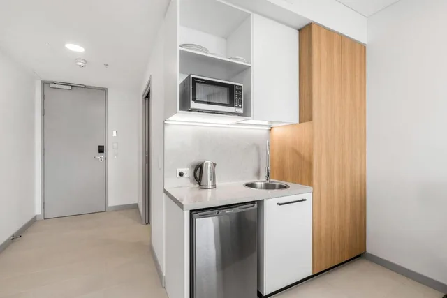 جناح استوديو بسرير مزدوج أو سريرين منفصلين، Essence Suites Taringa 6/8
