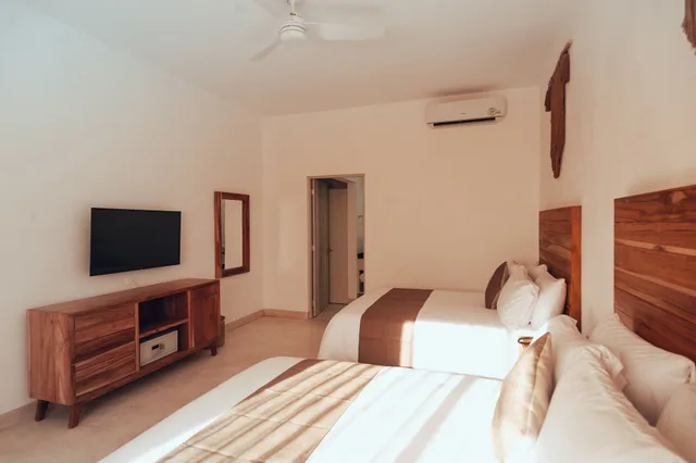 غرفة ديلوكس بسريرين كوين بإطلالة على المسبح، Collection O Kaab Downtown Tulum 2/9