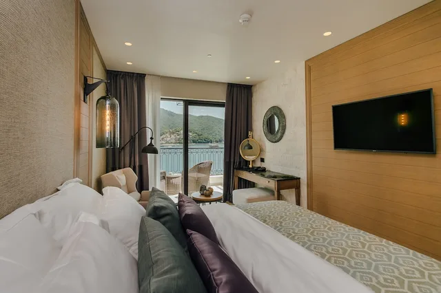 غرفة ديلوكس بسرير كوين بإطلالة على البحر بشرفة، Casa Del Mare Mediterraneo 3/7